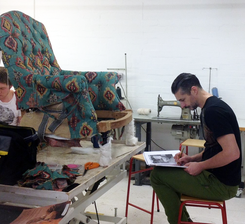 Student at the one of the industrial sewing machines